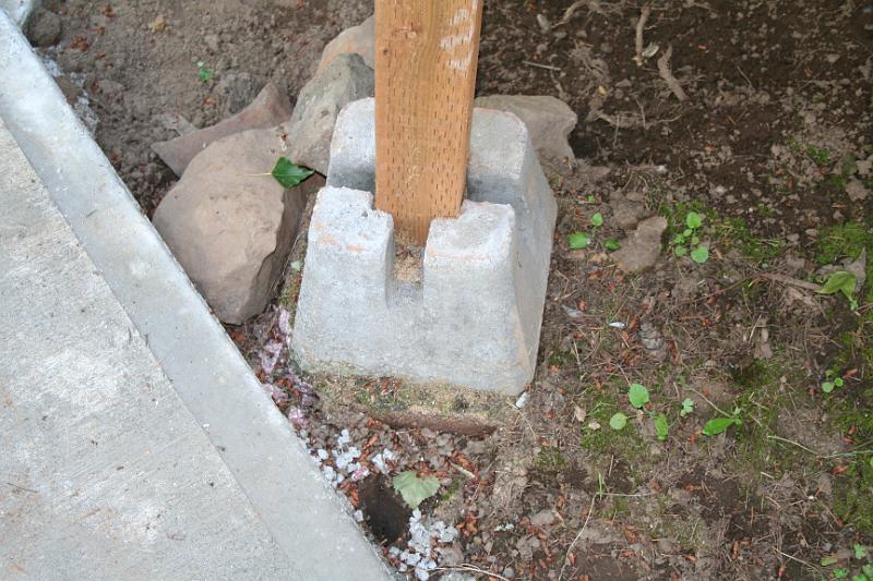IMG_1750.JPG - Rocks placed inder block used to hold up deck (Right side)
